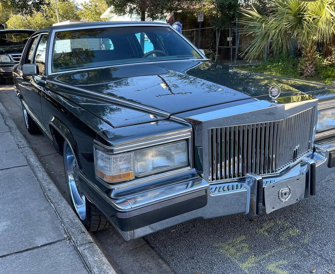 Black car with a chrome grille