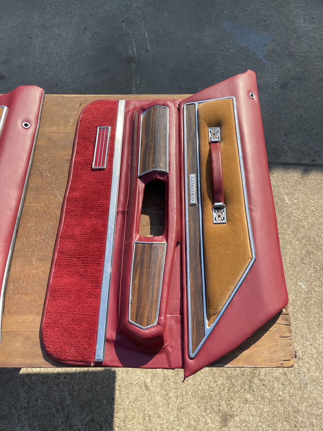 Red door panel with woodgrain trim
