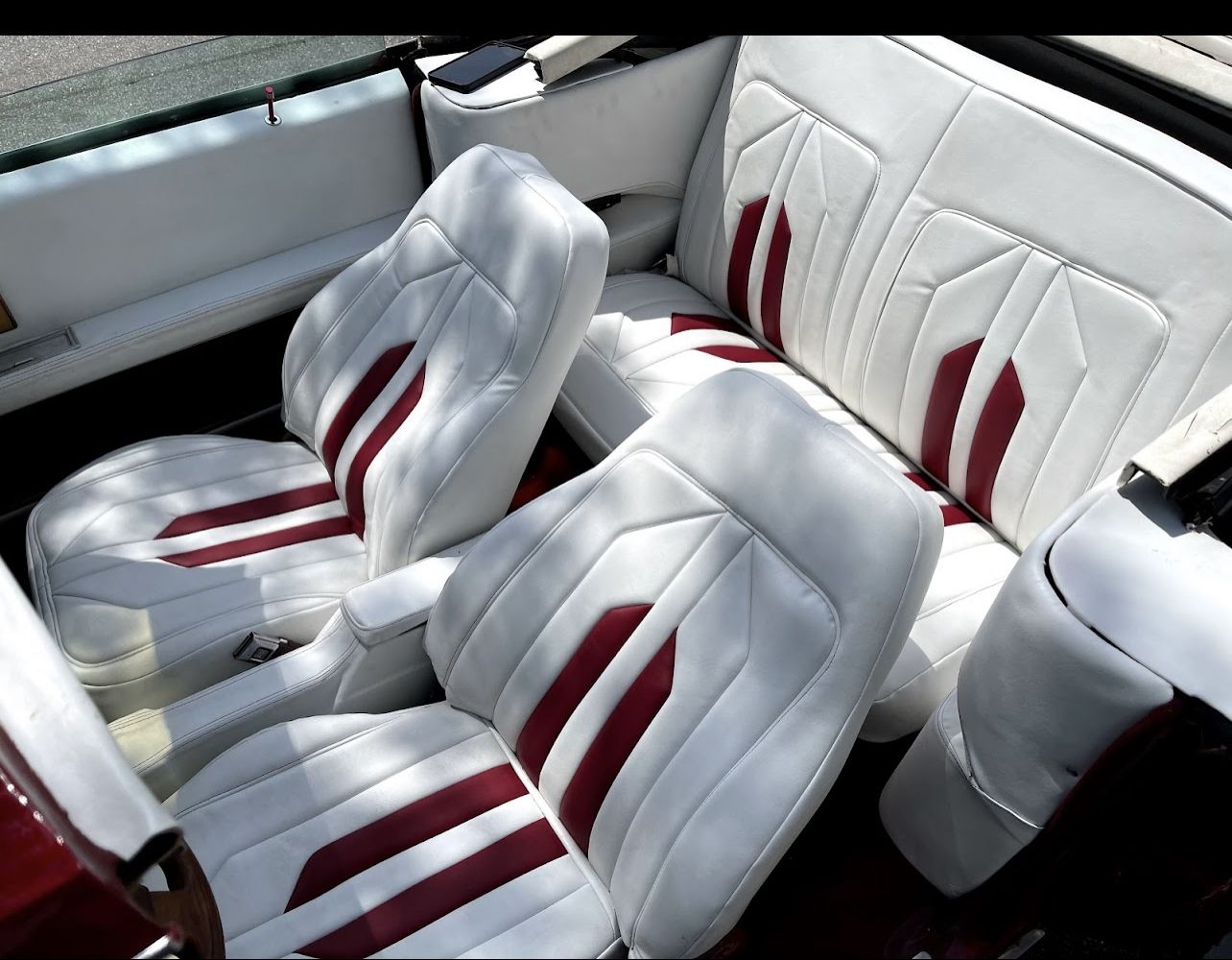 White and burgundy custom seats